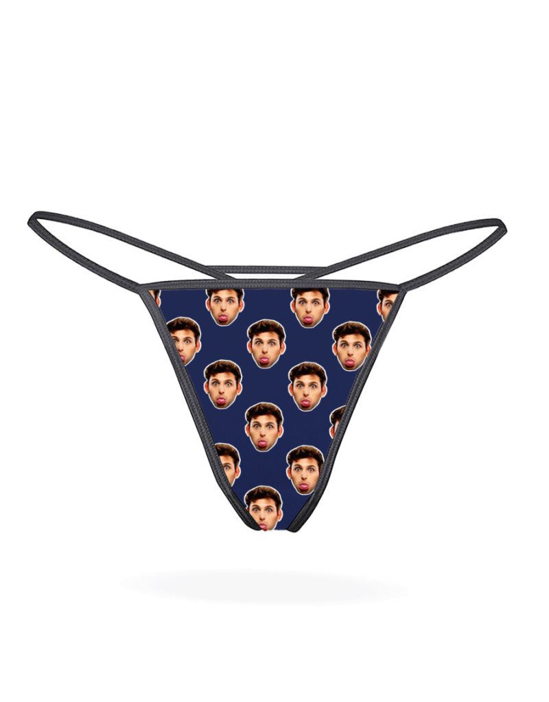 Face navy thongs